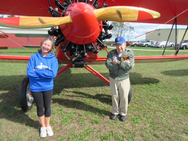Ilse Harmacinski and Doug Holt in front of the Stearman C3B at the Kelch Aviation Museum open house, Saturday, Sept. 11, 2015