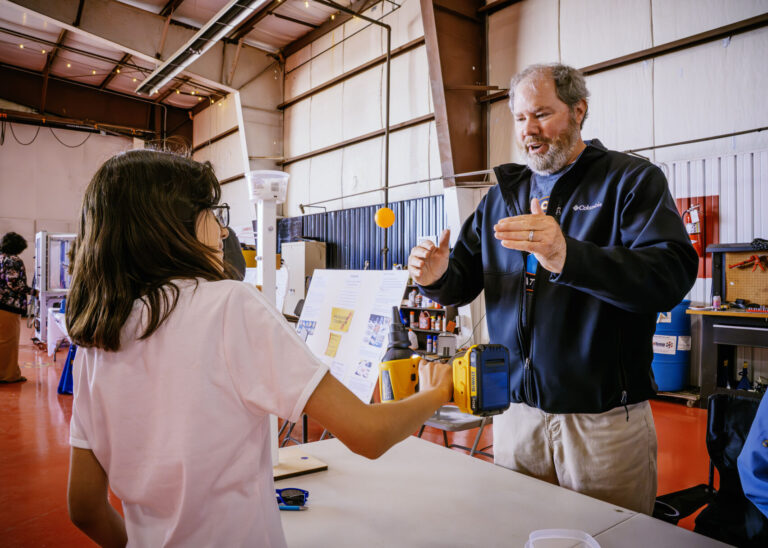 Educator Mike Flory during a science activity day for students of all ages